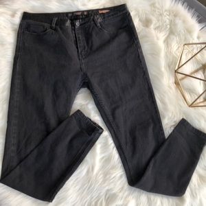 Black skinny jeans with leather trim
